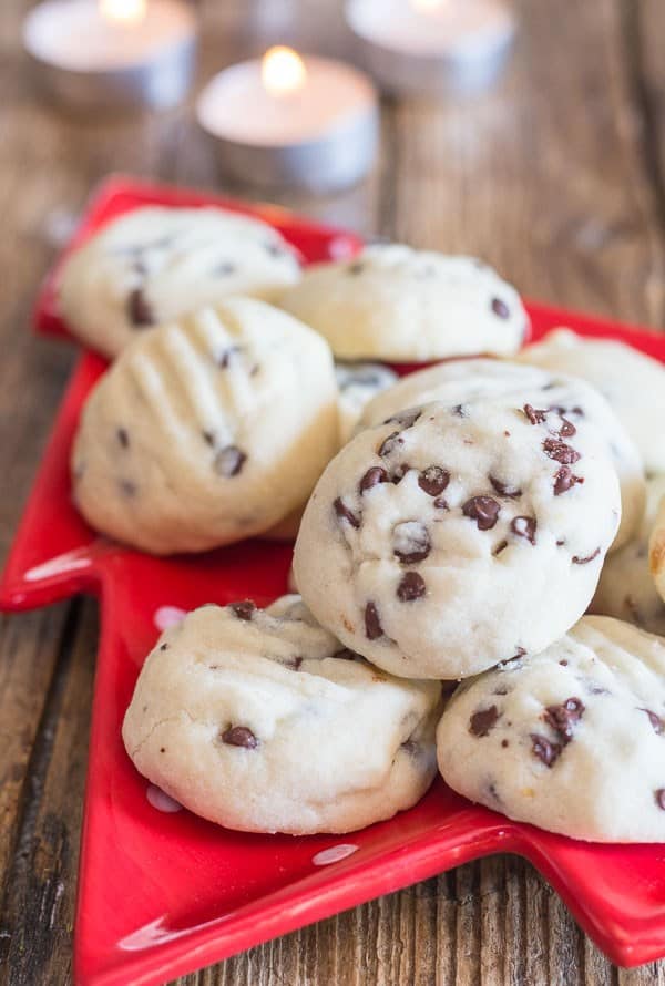 Easy Chocolate Chip Whipped Shortbread Cookies are the absolute melt in your mouth short bread cookie. Fast, easy and they will be gone in seconds.