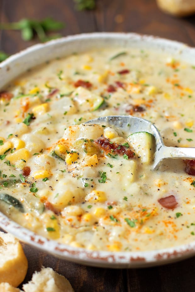  Put all of that fresh produce to good use in this summer corn and zucchini chowder. It’s thick, creamy and full of veggies!