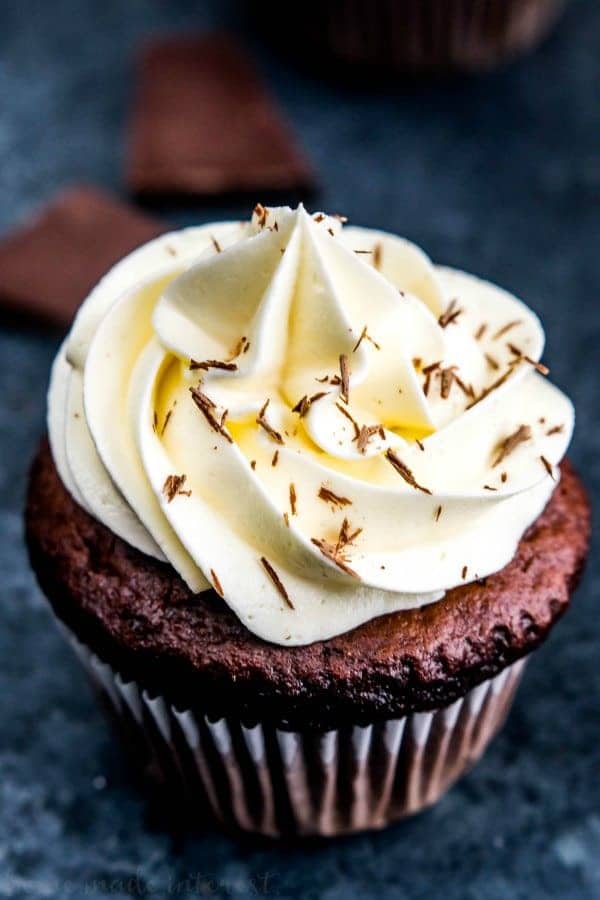These decadent Triple Chocolate Cupcakes are filled with a creamy chocolate ganache and topped with a luscious white chocolate frosting! It’s a rich chocolate dessert recipe everyone will love.