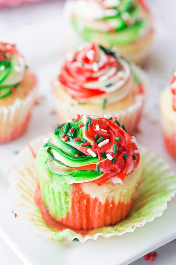ery Merry Tricolor Christmas Cupcakes in red, green and white have a hint of peppermint! See how easy it is to turn plain cupcakes into colorful marble cupcakes and frosting, just like fancy café-style confections.