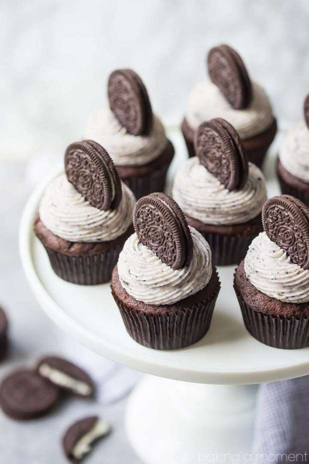 Make these Oreo Cookies & Cream Cupcakes! Moist chocolate cake topped with a frosting that tastes just like the cream filling in an Oreo!
