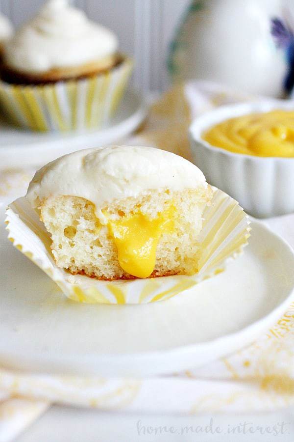 These Coconut Mango Cupcakes are soft and fluffy and filled with tangy mango curd for a tropical dessert you’ll love!