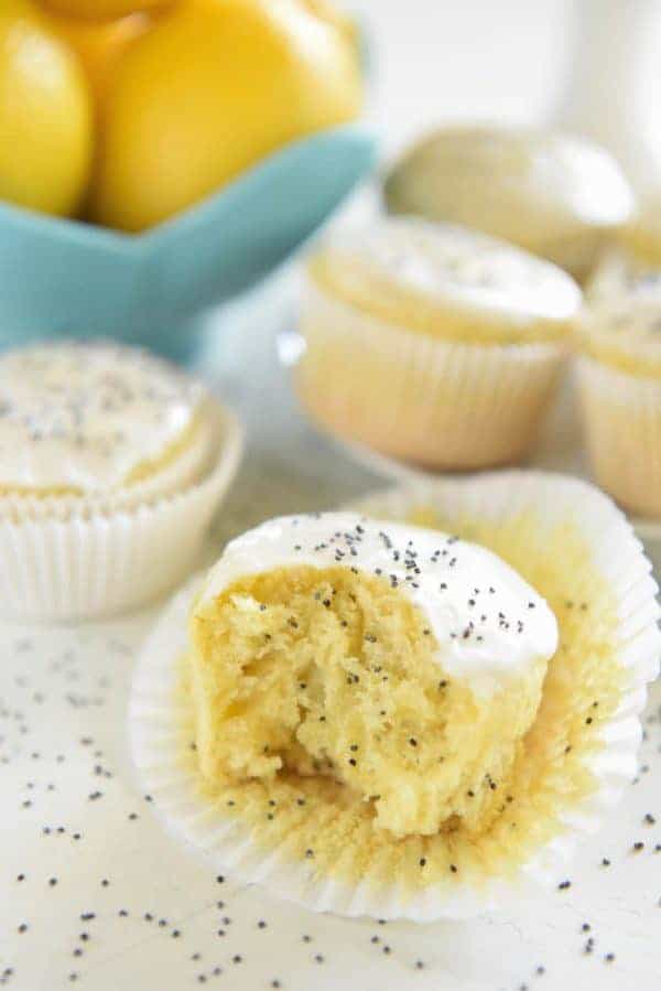 Lemon Yogurt Poppy Seed Muffins: you just need one bowl to make these bright and zesty muffins that are bursting with flavor and topped with a sweet lemon glaze!