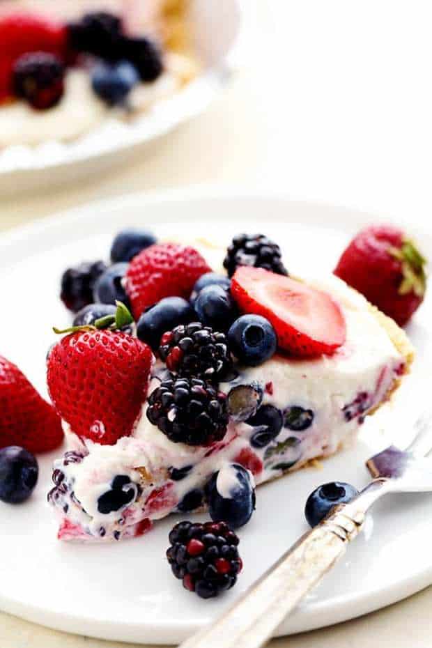 No Bake Very Berry Cheesecake comes together in just 10 minutes!  It is filled with fresh summer berries hidden inside a creamy cheesecake and is incredible!
