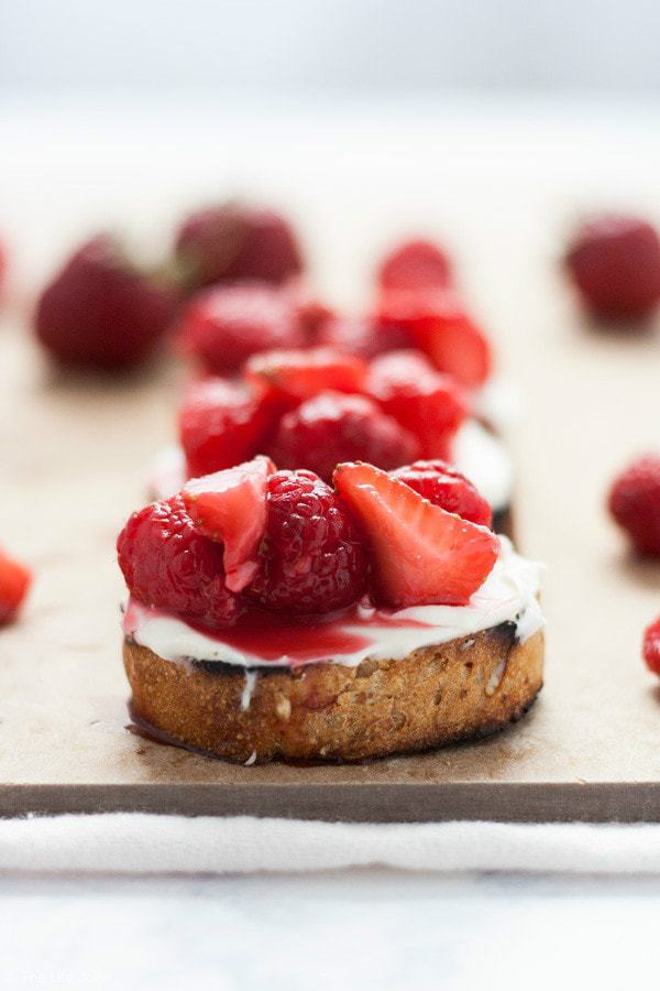 This Summer Berry Dessert Crostini recipe is a light and delicious summer dessert. You can also call it dessert bruschetta. It uses ripe summer berries, mascarpone cheese sweetened with honey and grilled baguette. This easy dessert is super quick to make and a real crowd pleaser!