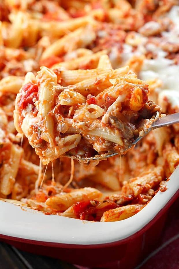 Skinny Cheesy Pasta Bake is a delicious layered casserole made lighter by using ground turkey and whole wheat pasta!