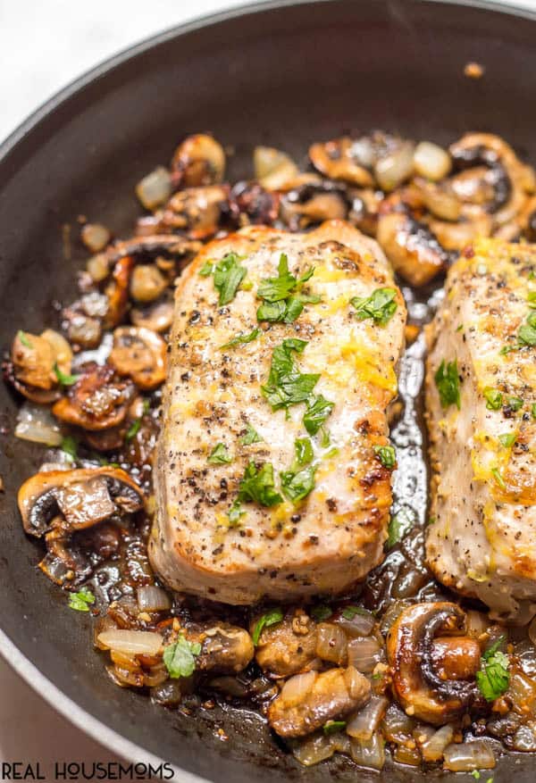 Garlic Butter Pork Chops are an easy one-pan dinner with a delicious mushroom-onion mixture and a hint of lemon to brighten all the flavors! Perfect for a low-carb family dinner!
