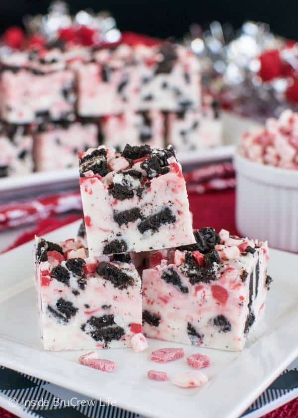 This easy Peppermint Cookies and Cream Fudge is loaded with chocolate cookies and peppermint swirls.  I promise that this delicious holiday fudge will disappear off the cookie trays in minutes.