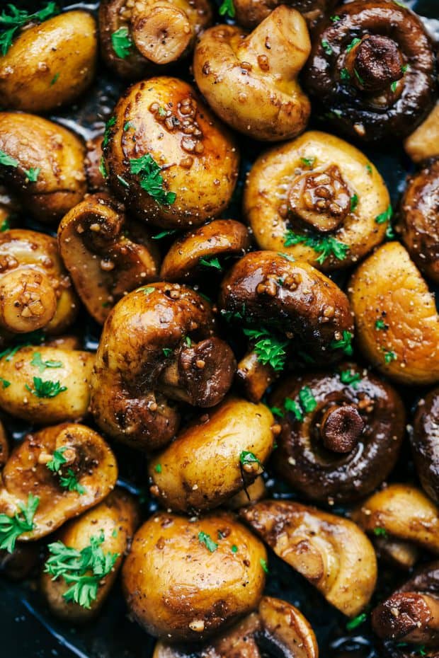 Honey Balsamic Garlic Mushrooms are sautéed in the most incredible honey balsamic garlic sauce.  This makes an excellent topping for steak or chicken or is even great as a side dish!