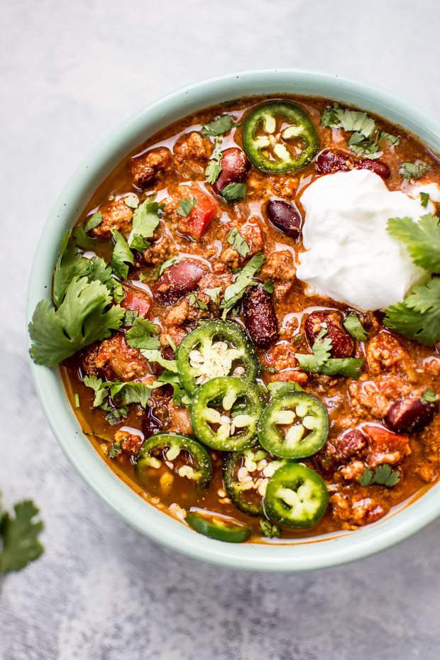  This easy crockpot turkey chili recipe is healthy, hearty, and comforting. A big batch will give you tons of tasty leftovers! It’s the perfect thing to pop in the Crockpot on a Sunday morning.