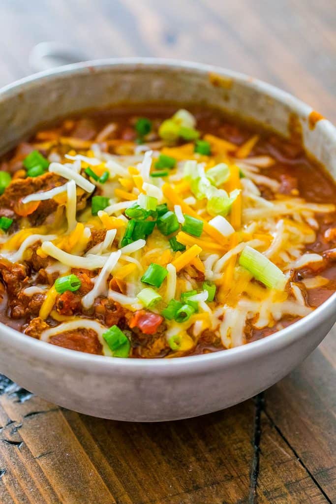 Double Beef Chili – with both stew meat and ground beef – has a ton of hearty, delicious flavor. A perfect tailgate chili recipe everyone loves!