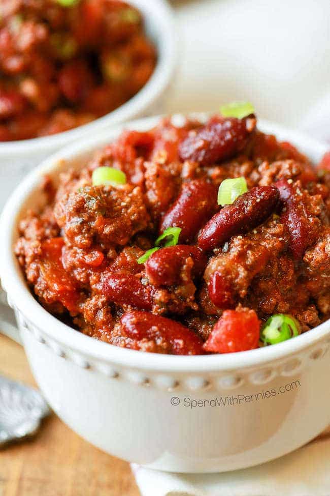 This Easy Crock Pot Chili recipe is loaded with ground beef, seasonings & tons of flavor. It simmers all day in the slow cooker creating a great meal that is just as delicious leftover!