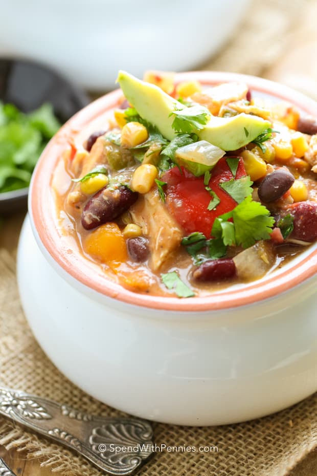 This Slow Cooker Chicken Chili recipe comes together in just a few minutes and creates a hearty and healthy dinner that the entire family will love!