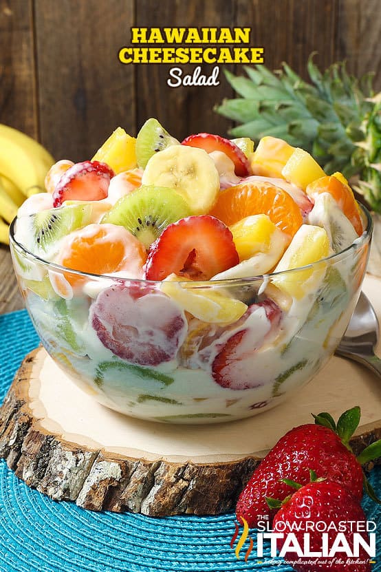 Hawaiian Cheesecake Salad comes together so simply with fresh tropical fruit and a rich and creamy cheesecake filling to create the most glorious fruit salad ever! Every bite is absolutely bursting with island flavor and you are going to go nuts over this recipe!
