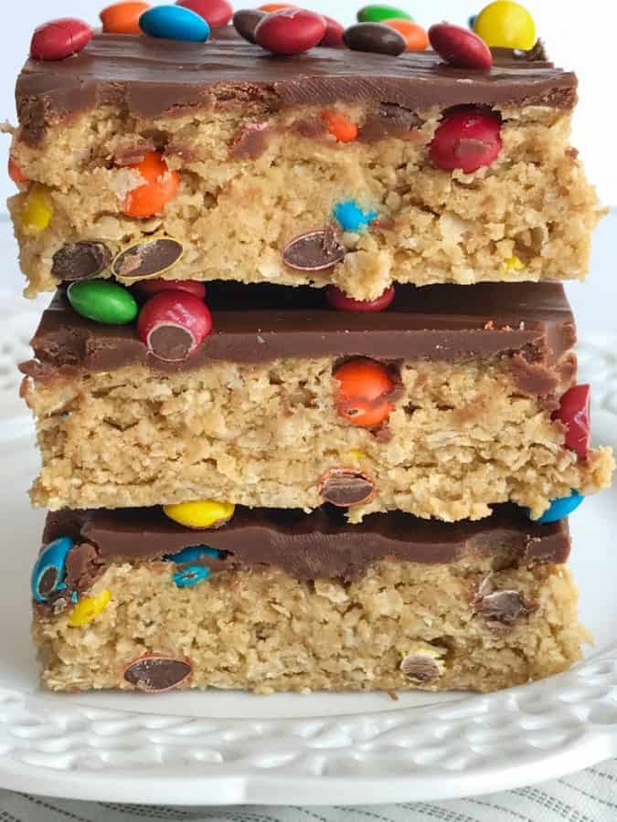 All your favorites about monster cookies but in no-bake, egg free monster cookie dough bars! Peanut butter, oats, chocolate, and m&m’s. These can be made in just minutes and are a fun treat or dessert for the kids to make. Everyone will love these easy and simple cookie dough bars.