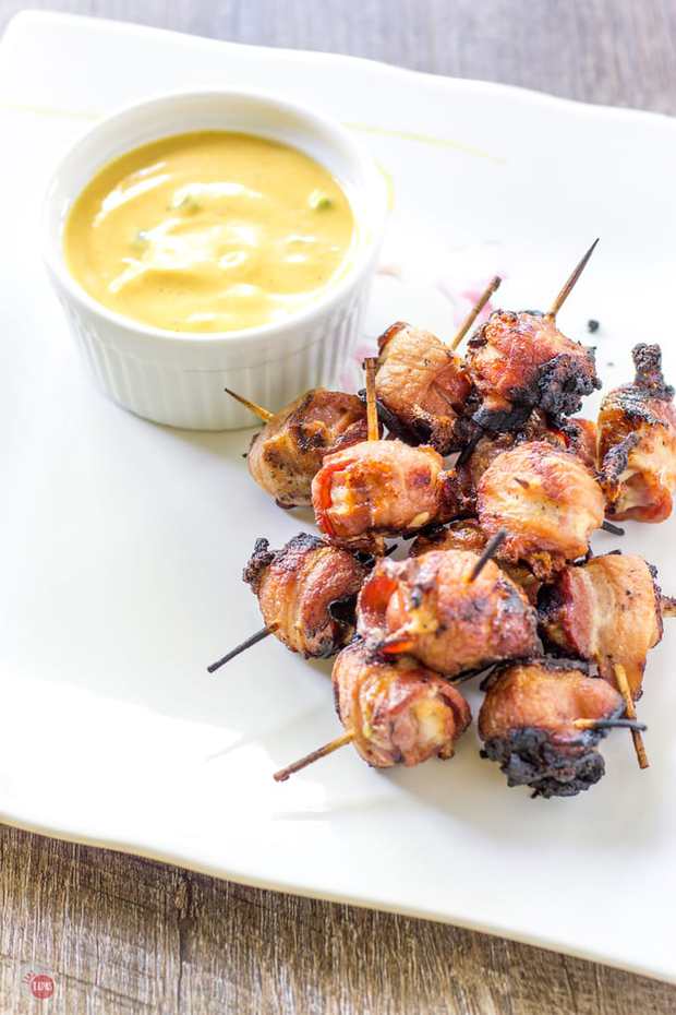 Grab your grill and some kitchen staples and whip up a great appetizer for your summer get-together! These Bacon Wrapped Hot Dog Bites are your new favorite summer snack!