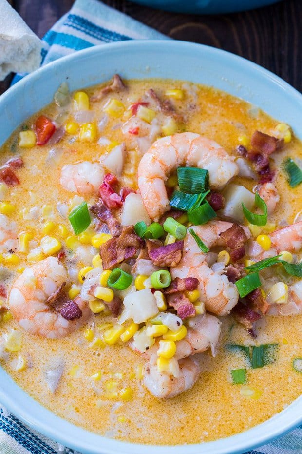 Cajun Shrimp and Corn Chowder is a hearty soup for cold weather with chunks of potato and salty pieces of bacon. Serve with a crusty piece of bread for a comforting cold weather meal.
