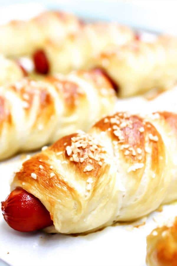 Simple & delicious these Easy Pretzel Hot Dogs are a fun way to devour a summer barbecue must-have.