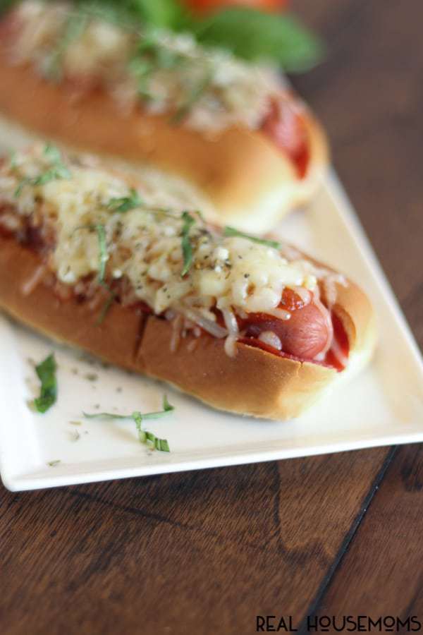 Pizza Hot Dogs take on a fun flavor featuring pepperoni, sauce, and gooey cheese for the ultimate kid-pleasing meal!