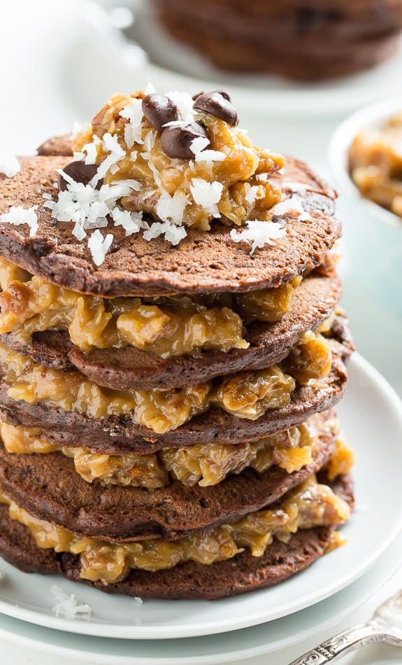  I’ve made a lot of over the top pancake recipes that resemble dessert more than breakfast, but these German Chocolate Pancakes really take the cake. The classic southern cake is turned into a truly decadent breakfast with these German Chocolate Pancakes.