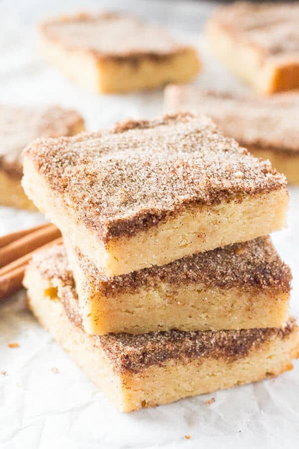 These Snickerdoodle Cookie Bars have a soft and chewy texture, delicious buttery flavor, and crunchy cinnamon sugar topping.