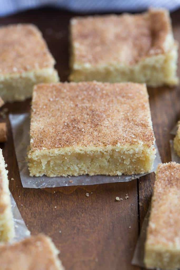 My favorite cookie recipe transformed into the BEST super soft and chewy snickerdoodle bars, and they couldn’t be easier to make.