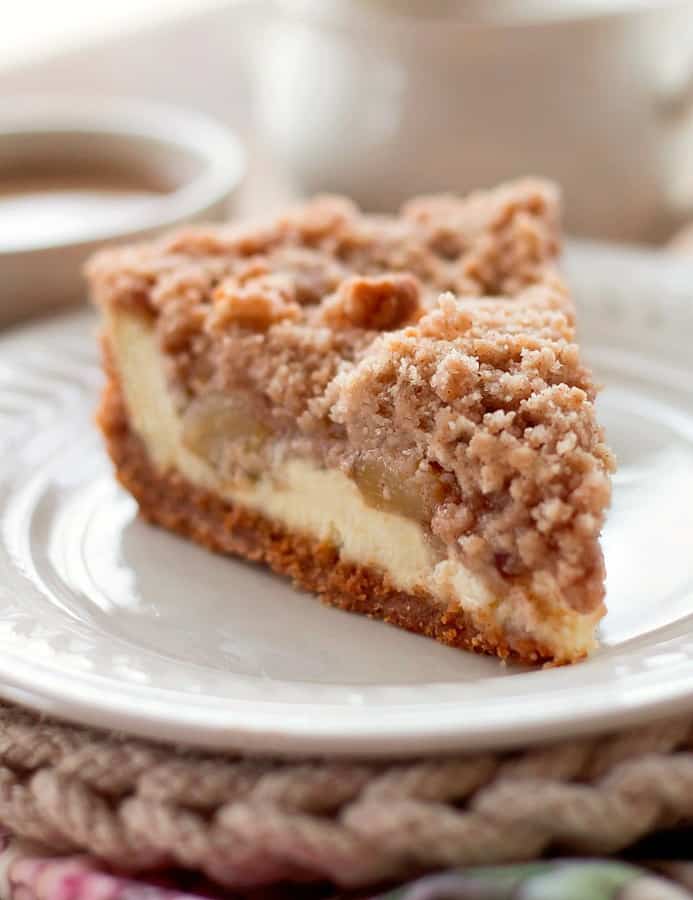 Snickerdoodle Cream Cheese Apple Pie is made with a snickerdoodle cookie crust. The crumb topping is made with…yes Snickerdoodle Cookie Dough!