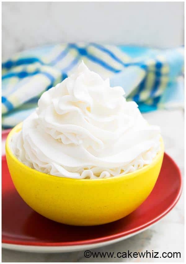 Quick and easy classic american buttercream frosting recipe, requiring 4 ingredients. It holds its shape. Great for cake decorating and cupcake decorating!
