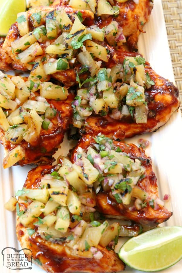 Grilled BBQ Chicken with Pineapple Salsa is made by smothering grilled chicken with thick & flavorful bbq sauce then topping it with a delicious pineapple salsa made with lime and jalapeno. Perfect for weeknight dinners or weekend get-togethers, the pineapple salsa pairs perfectly with the tangy grilled barbecue chicken.