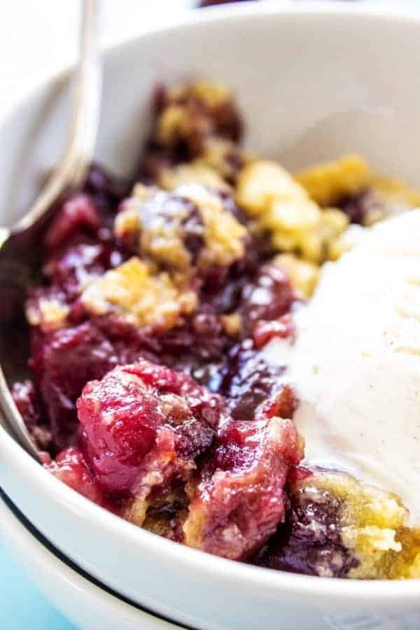 This CHERRY COBBLER RECIPE is the best ever. A deliciously simple way to enjoy fresh cherries without too much work.