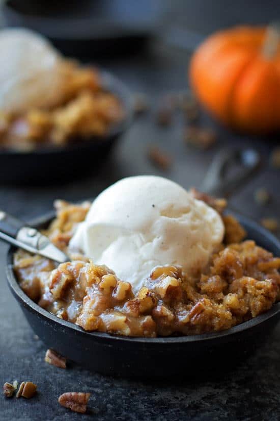 This pumpkin praline skillet cake is topped with a sweet and salty praline topping. It's the perfect dessert for fall!