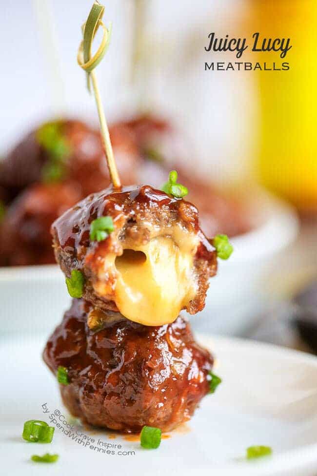 Gooey cheese stuffed inside a tender beef meatball and bathed in a spicy sweet sauce…  perfect for game day!