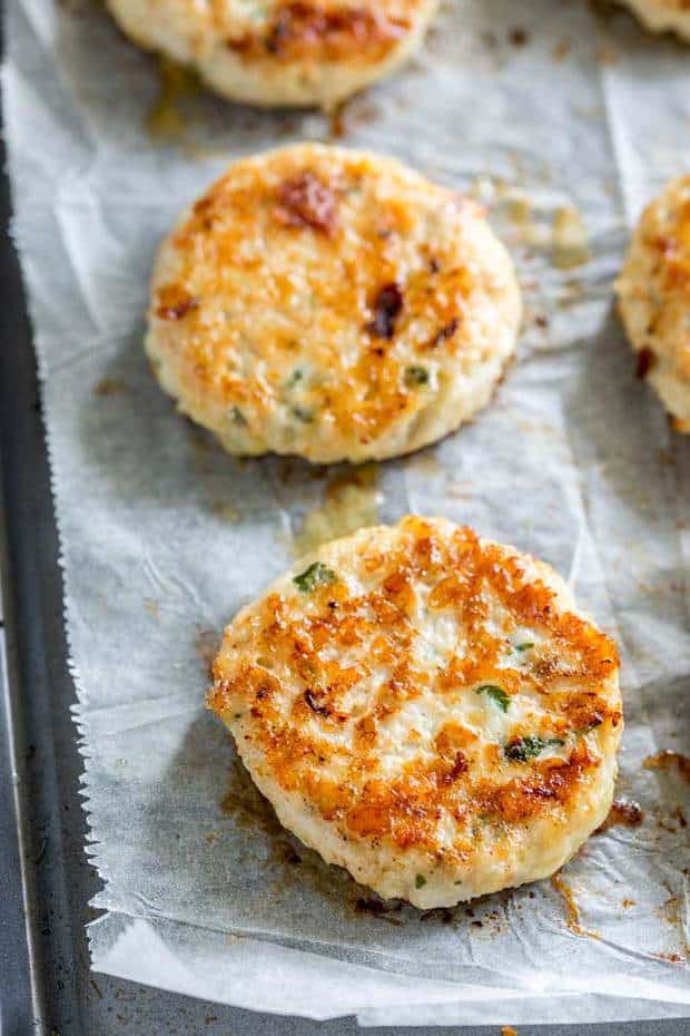 Everyone will love these Cauliflower Cheese Chicken Fritters. Not only do they make great party finger food they they are perfect for a mid-week family meal. Light, crispy, and packed with cauliflower, these are always demolished.