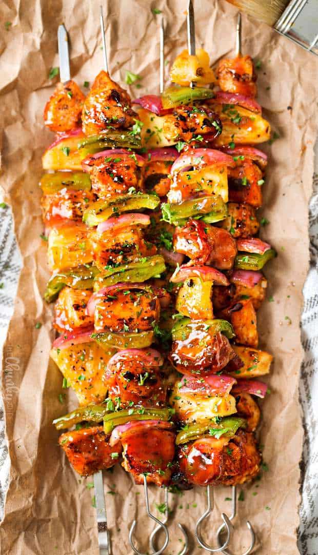 Spiced chicken, peppers, onions and bacon are skewered, basted with the tastiest bbq sauce, and grilled to perfection! Best chicken kabobs ever!