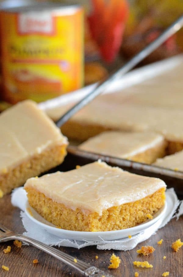 This easy homemade spiced pumpkin cake, is made in a sheet pan, in just 30 minutes and frosted with a creamy cinnamon cream cheese icing!