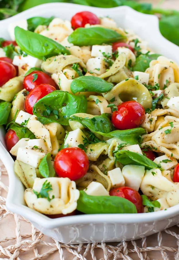 This caprese tortellini pasta salad is ready to rock your next party or BBQ! Feel free to make this healthy pasta salad in advance  – it’s great the next day!