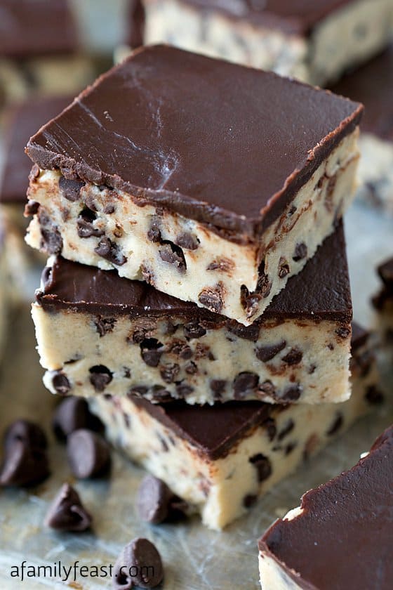 What’s great about this recipe is that you get that cookie dough flavor and texture – but without the raw eggs so it’s completely safe to eat.  And – OMG – these decadent bars are so very delicious!