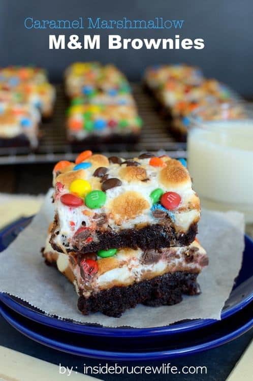 Brownies topped with three layers of goodness.  These Caramel Marshmallow M&M Brownies will definitely satisfy every sugar craving you have.  They are a great way to use up leftover candy too!