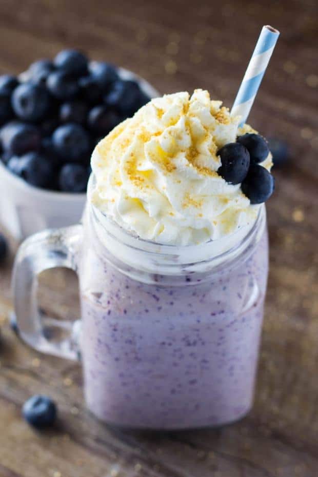 Super thick, super creamy Blueberry CHEESECAKE Milkshake. Seriously upping the deliciousness factor with this ice cream treat!