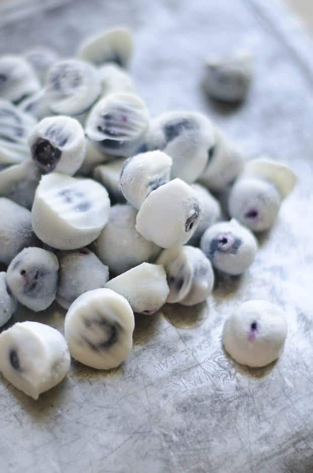 These Frozen Yogurt Blueberries are a simple, healthy snack that satisfy your sweet tooth big time. 