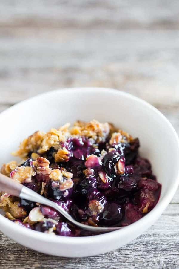 This blueberry rhubarb crisp is the perfect way to celebrate the bounty of summer. Sweet blueberries paired with tart rhubarb and topped with a crunchy rolled oat topping. It’s delicious eaten warm and even better when topped with ice cream or whipped cream.