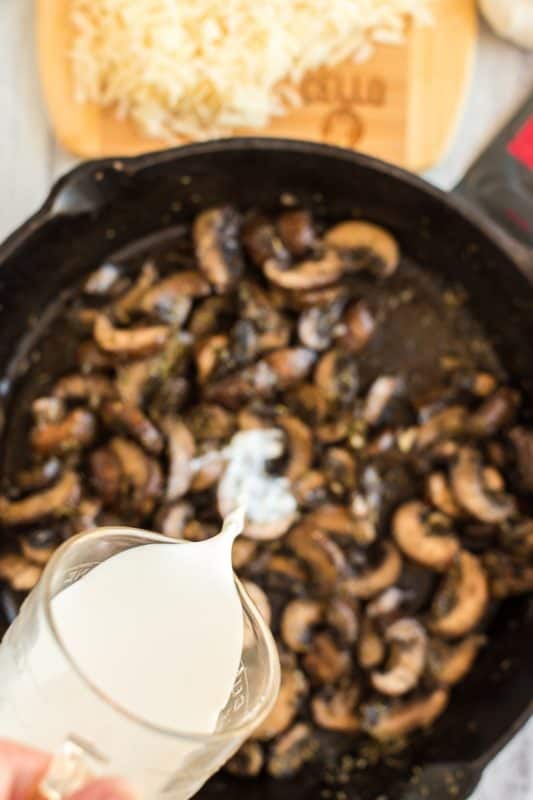 A bowl of food, with Mushroom and Cream