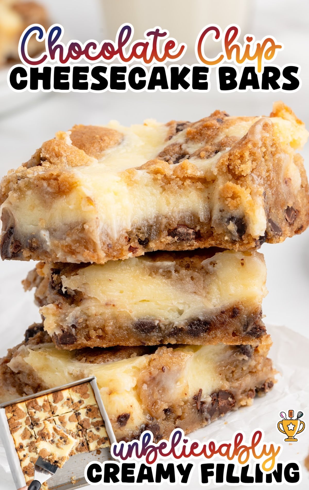 Stack of chocolate chip cheesecake bars with visible layers of cookie dough and creamy cheesecake filling, emphasizing the rich, soft texture.