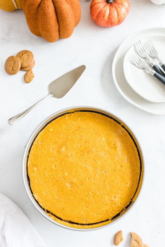 A plate of food on a table, with Pumpkin and Cheesecake