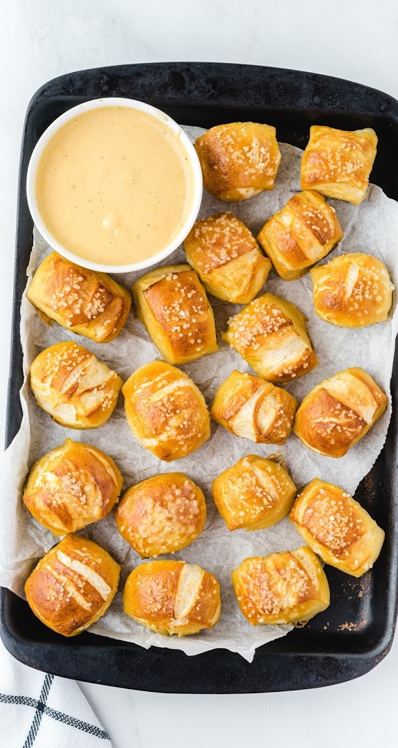 A tray of food, with Pretzel and Sauce