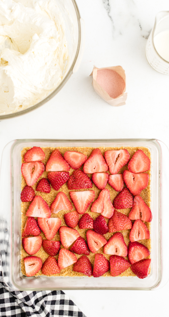 Strawberry Delight graham cracker layer cover with sliced strawberries