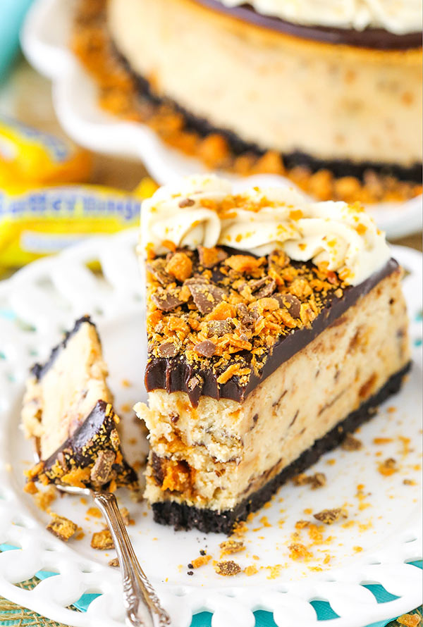 A piece of cake on a plate, with Butterfinger and Cheese