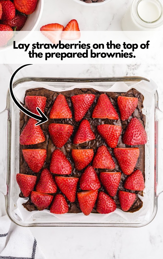 Lay strawberries over brownies