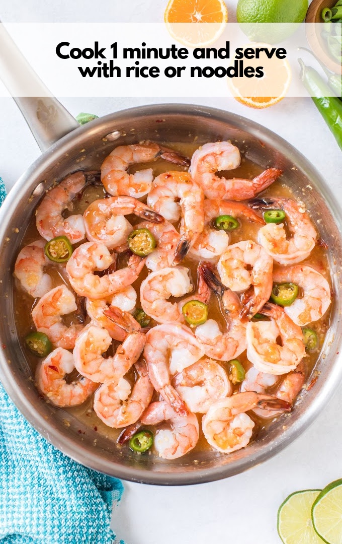 A bowl of food on a plate, with Shrimp and Garlic