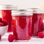 Homemade Raspberry Freezer Jam in a mason jar with a lid